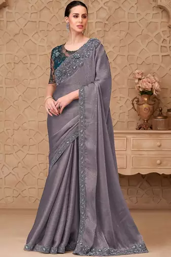 Green woven design sequinned art silk designer saree