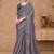 Green woven design sequinned art silk designer saree