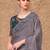 Green woven design sequinned art silk designer saree
