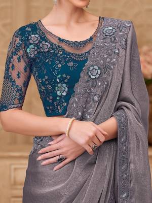 Green woven design sequinned art silk designer saree 4