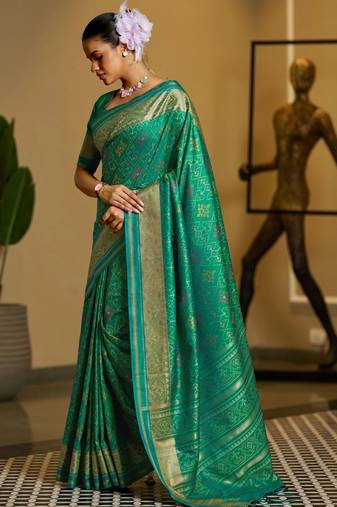 Green woven design zari silk blend designer patola saree