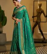Green woven design zari silk blend designer patola saree