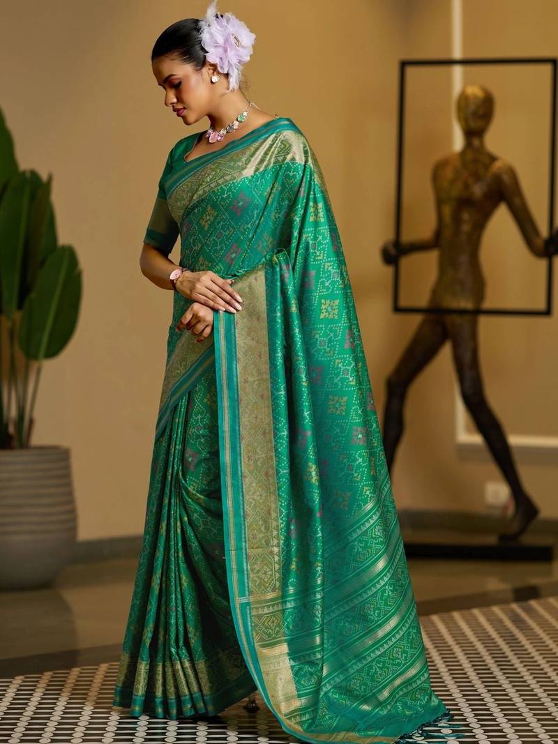 Green woven design zari silk blend designer patola saree