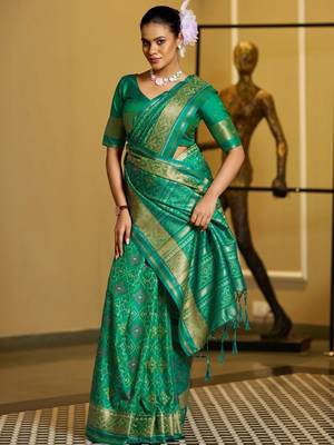 Green woven design zari silk blend designer patola saree 2