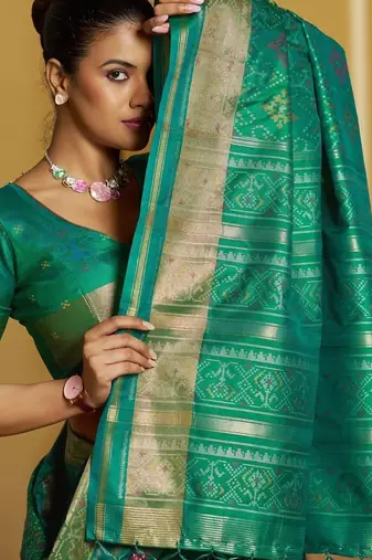 Green woven design zari silk blend designer patola saree