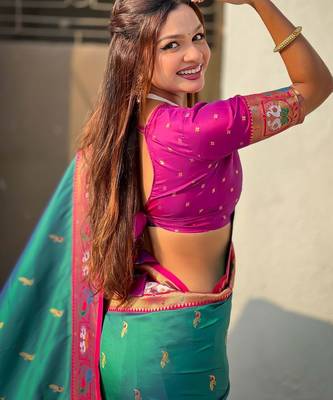 Green ethnic motifs zari silk blend paithani saree 4