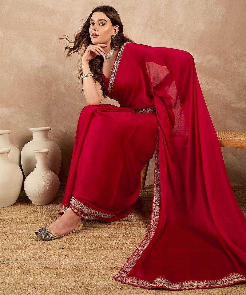 Red satin solid with embroidered border saree