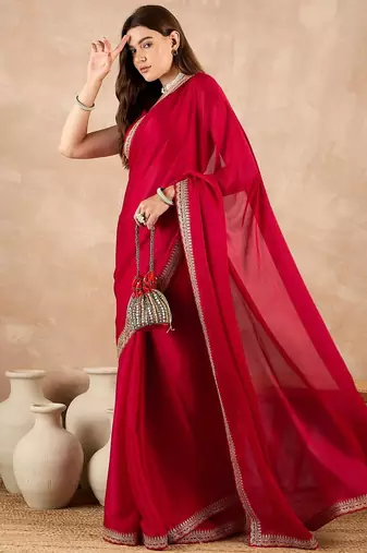 Red satin solid with embroidered border saree