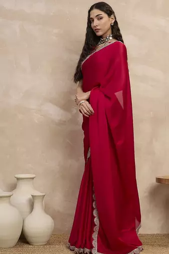 Red women sequinned border satin saree