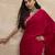 Red women sequinned border satin saree
