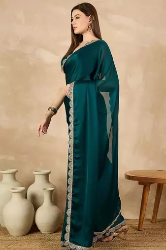 Green sequinned satin saree