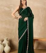 Green sequinned satin saree