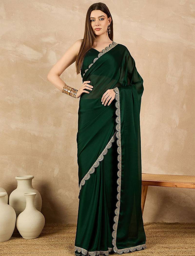 Green sequinned satin saree
