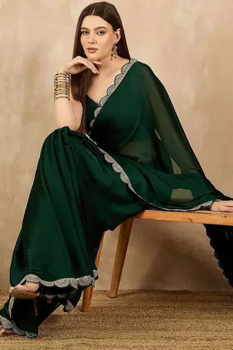 Green sequinned satin saree