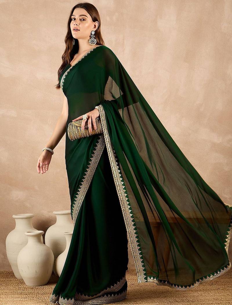 Green embroidered satin saree