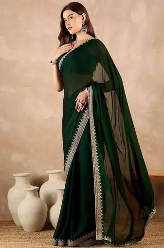 Green embroidered satin saree