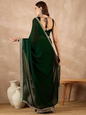 Green embroidered satin saree 4