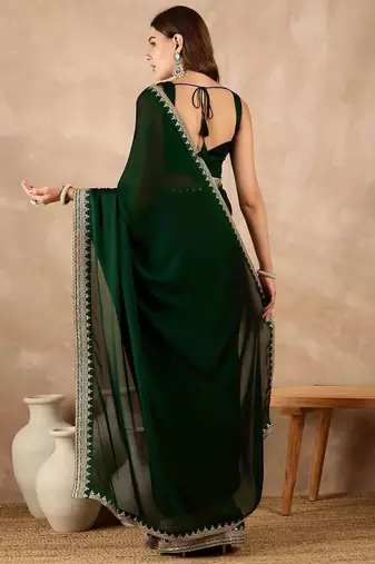 Green embroidered satin saree