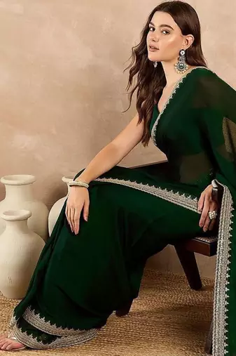 Green embroidered satin saree