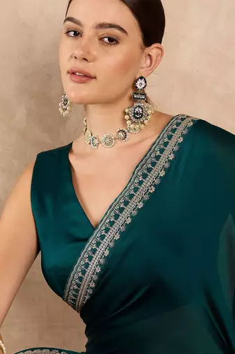Teal embroidered satin saree
