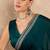 Teal embroidered satin saree