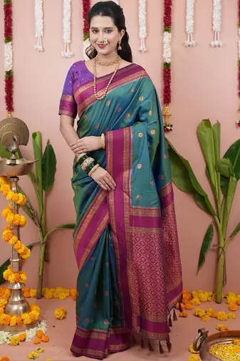 Green woven design zari silk blend banarasi saree