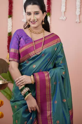 Green woven design zari silk blend banarasi saree