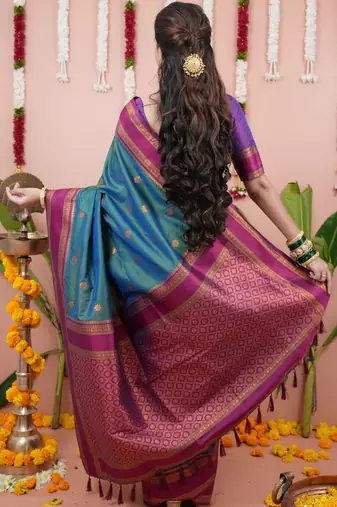 Green woven design zari silk blend banarasi saree