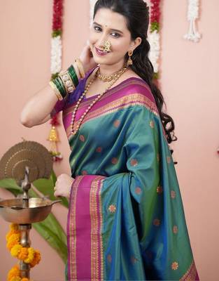 Green woven design zari silk blend banarasi saree 4