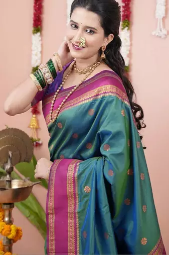 Green woven design zari silk blend banarasi saree
