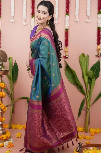 Green woven design zari silk blend banarasi saree