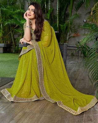Lime ethnic motifs embroidered  georgette heavy work saree 1