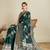 Green ethnic motifs woven design zari banarasi saree