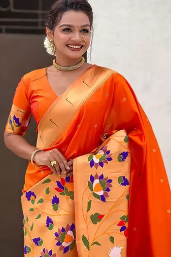 Orange woven design zari paithani saree