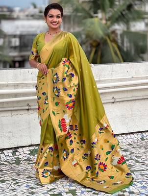 Green woven design zari paithani saree 1