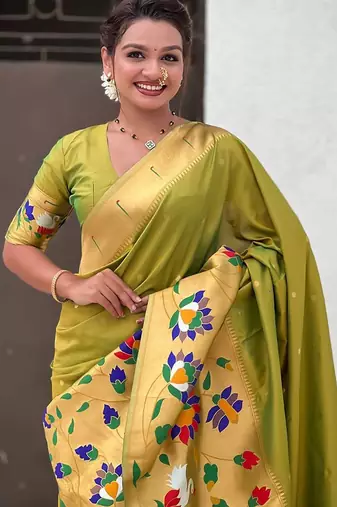 Green woven design zari paithani saree
