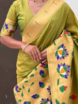 Green woven design zari paithani saree 5