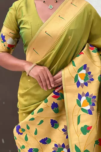 Green woven design zari paithani saree