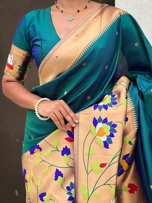Green woven design zari paithani saree 5
