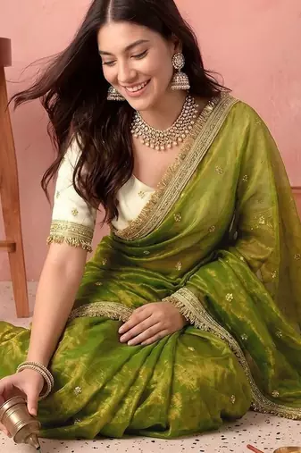 Green embellished zari tissue saree