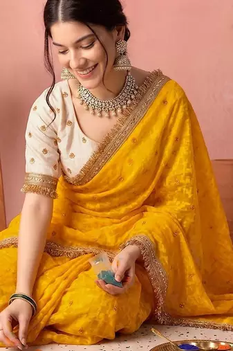 Yellow embellished zari tissue designer saree