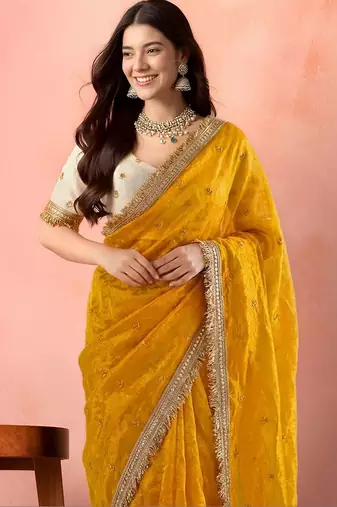 Yellow embellished zari tissue designer saree
