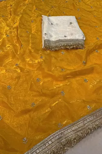 Yellow embellished zari tissue designer saree