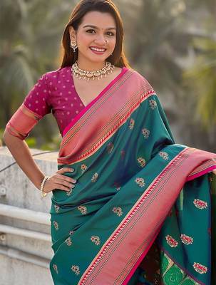 Green woven design zari silk blend paithani saree 4