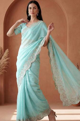 Turquoise embroidered tissue saree