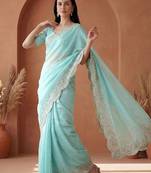 Turquoise embroidered tissue saree