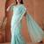 Turquoise embroidered tissue saree