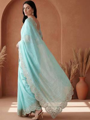 Turquoise embroidered tissue saree 4