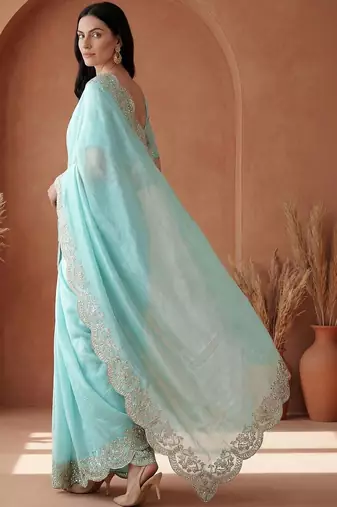 Turquoise embroidered tissue saree