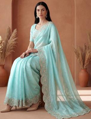 Turquoise embroidered tissue saree 5